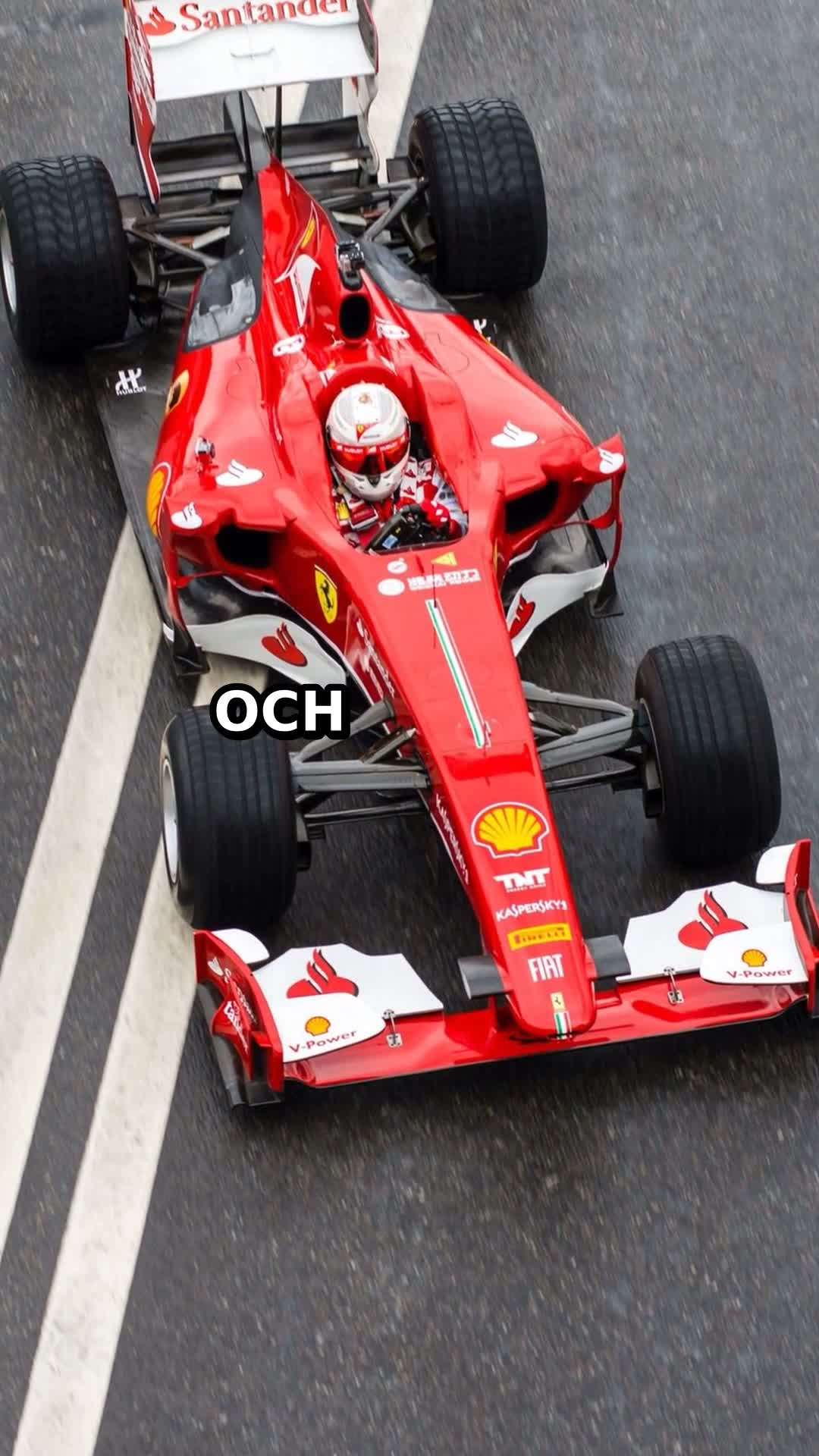 formel 1 bil med publik i bakgrunden