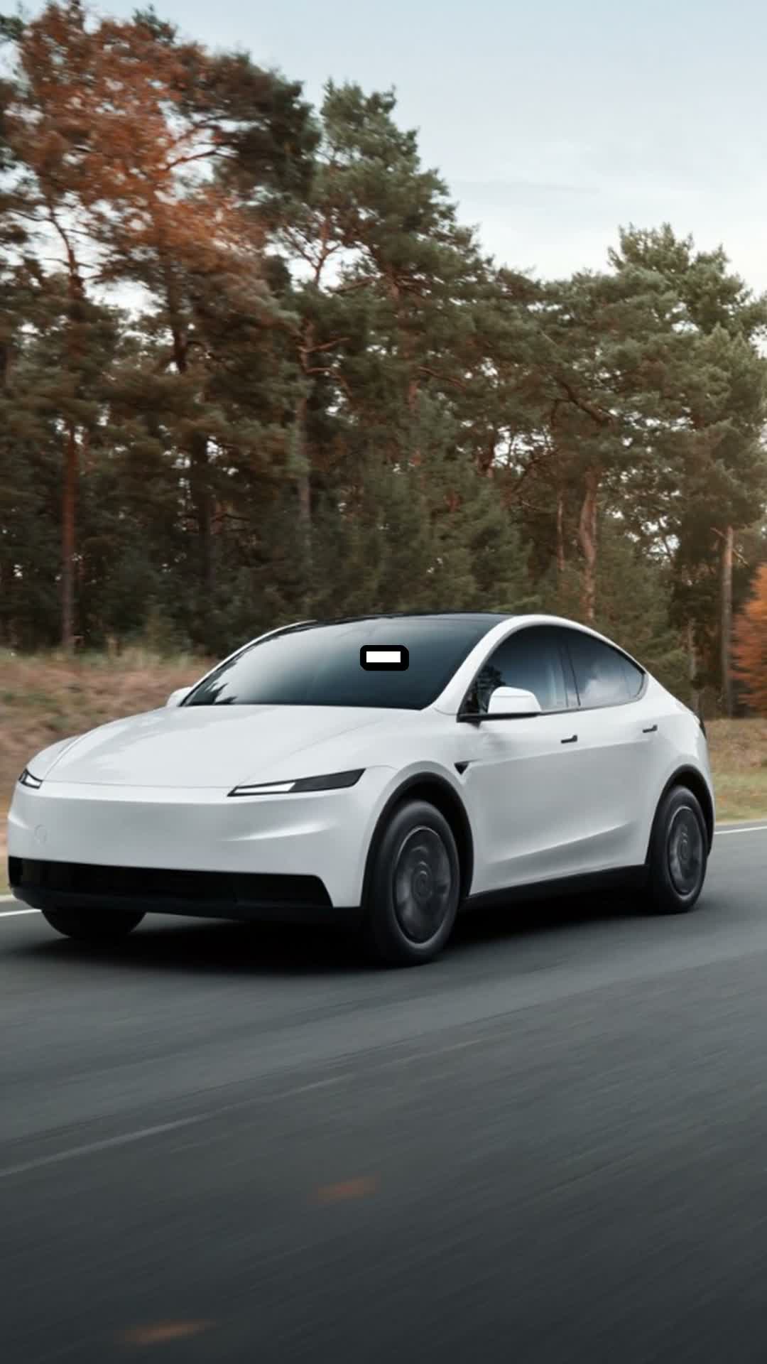 tesla model y på en väg