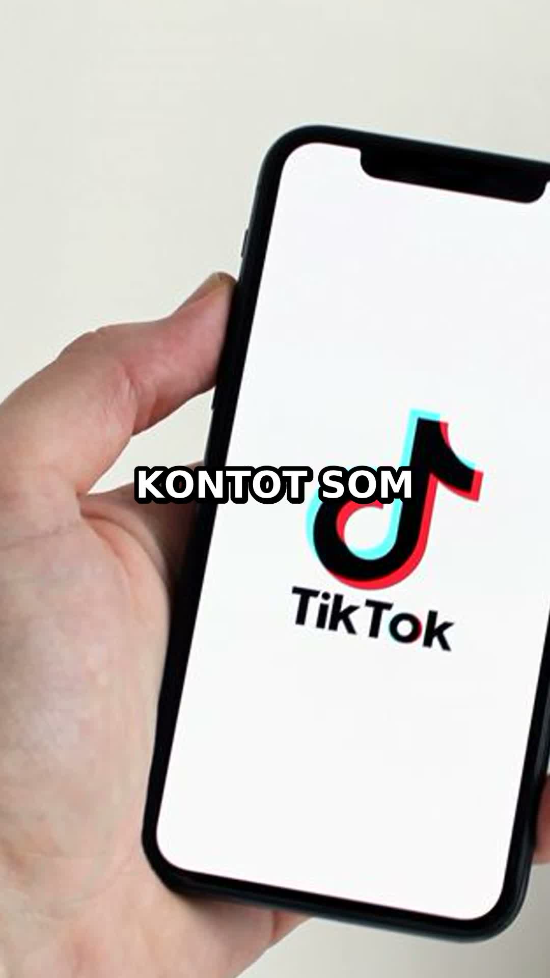 telefon med tiktokappen på skärmen